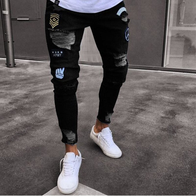 Men's Ripped jeans Badge Letters Hip - hop Skinny Jogging Denim Fashion Pencil Long Trousers Distressed Jeans For Men Clothing - CarlastoreMen's Ripped jeans Badge Letters Hip - hop Skinny Jogging Denim Fashion Pencil Long Trousers Distressed Jeans For Men ClothingCarlastoreCarlastore