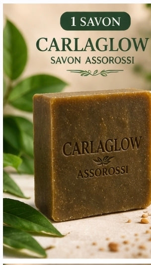 Savon Carlaglow Assorossi fait à la main, à base d’ingrédients naturels : feuilles d’assorossi, moringa, curcuma, miel, beurre de karité, huile de coco, olive, amande, ricin et vitamine E.
Nettoie, nourrit et illumine la peau en douceur
