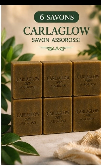 Savon Carlaglow Assorossi fait à la main, à base d’ingrédients naturels : feuilles d’assorossi, moringa, curcuma, miel, beurre de karité, huile de coco, olive, amande, ricin et vitamine E.
Nettoie, nourrit et illumine la peau en douceur